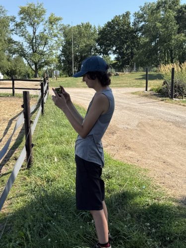 Cade, taking a picture of Valkyrie.